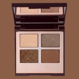 Bronzy quad luxury eyeshadow palette in dark background